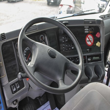 Used FREIGHTLINER Columbia Tri-Axle Steel Dump Truck for sale